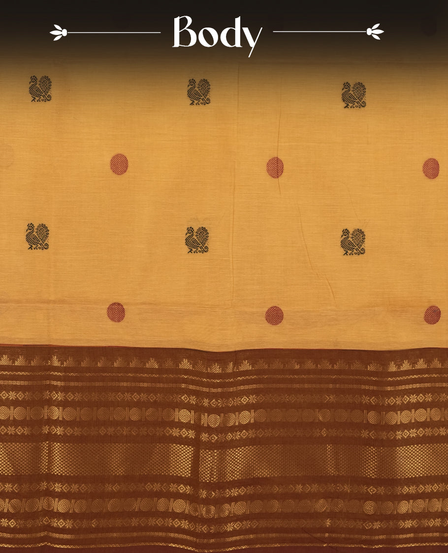 Pastel brown colour Chettinad cotton saree featuring intricate dark contrast golden zari weaving on the border , The rich traditional motifs add a regal charm & Comes with a matching blouse piece.