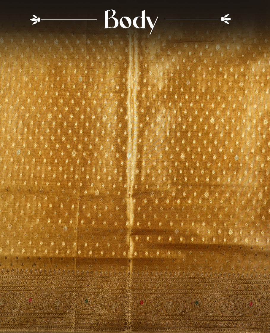 Yellow Gold colour tissue banaras silk saree featuring antique gold zari motifs on the body with rich traditional zari border and pallu, paired with a matching blouse piece.