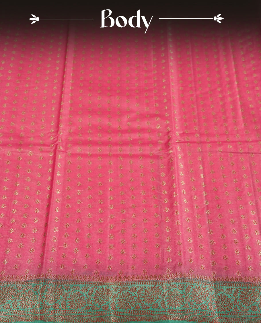 Pink colour pure tussar silk saree adorned with subtle silver zari motifs all over, complemented by a rich contrast aqua blue Banarasi border & Comes with a matching blouse piece.