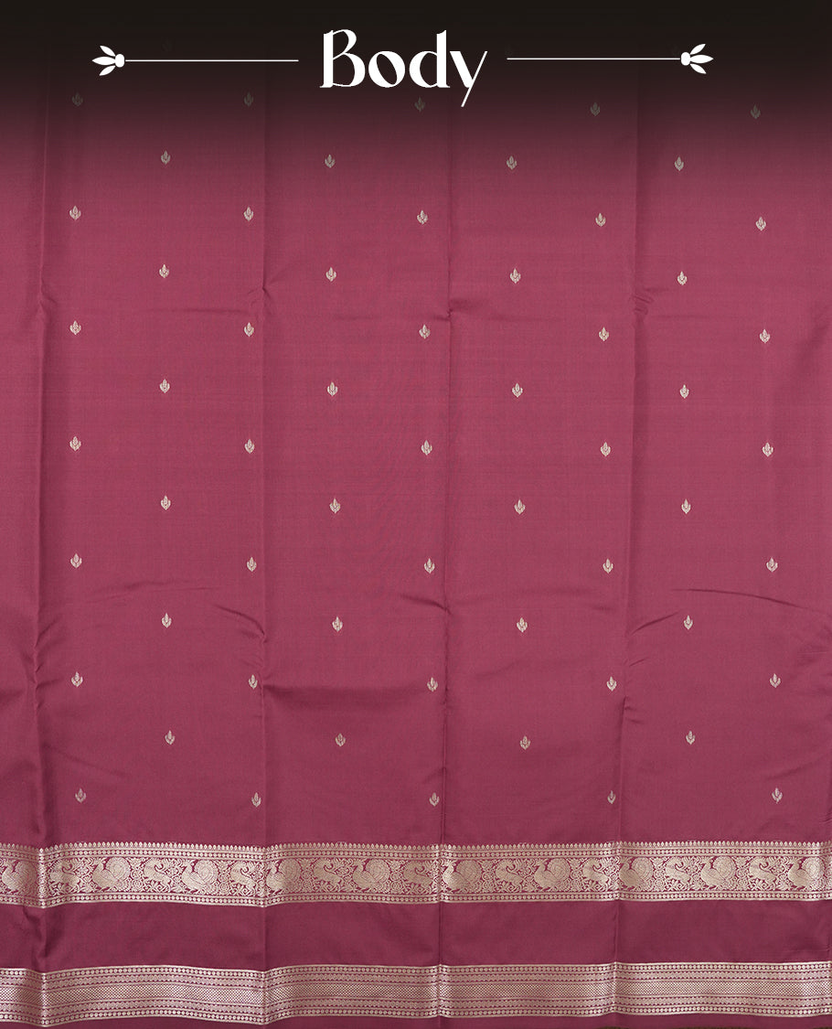 twilight lavender colour semi soft silk saree featuring a gold colour textured patterned body, complemented by self coloured golden motifes on pallu & border and a matching blouse piece.