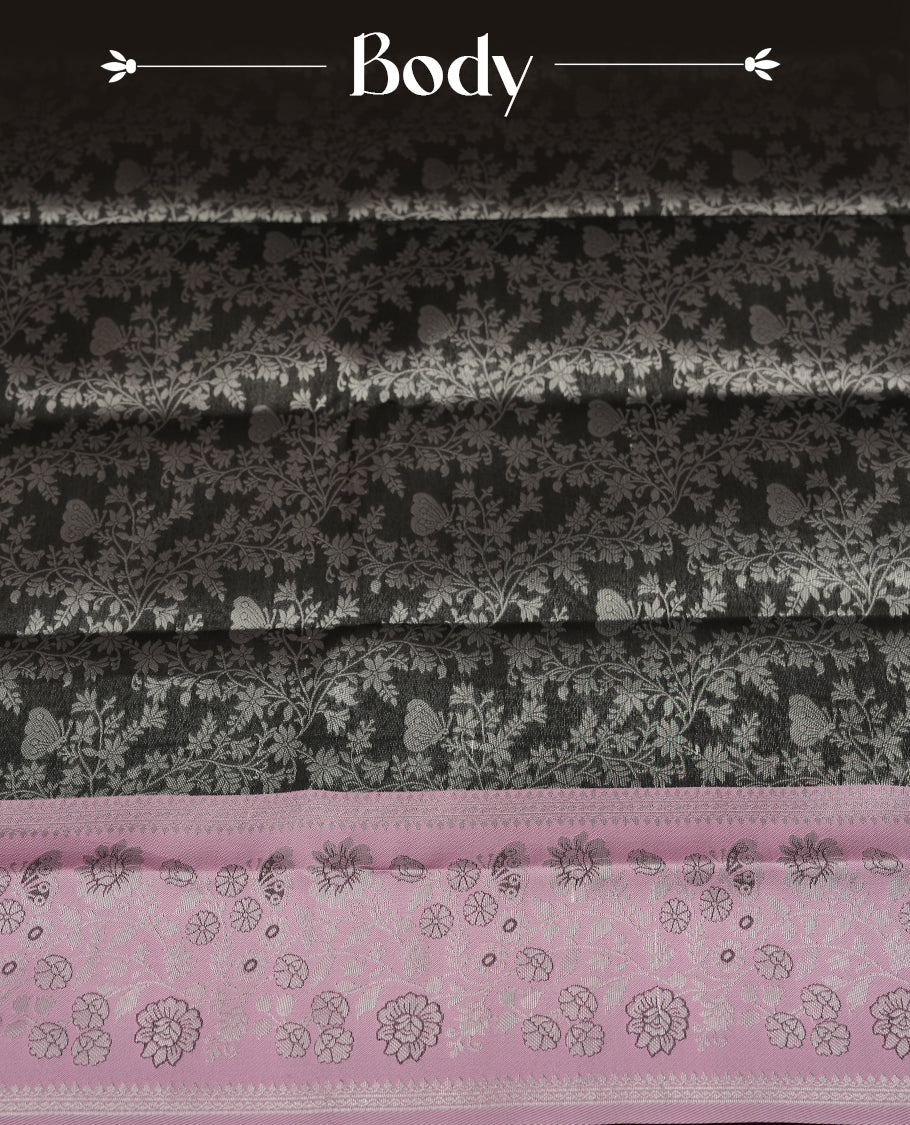 Charcoal Black colour Semi Silk Saree with Silver Zari Floral Self-Weave on the Body, Contrasting Pastel Mauve Zari Woven Pallu and Border with Intricate Geometric Motifs and Tassels, Paired with Coordinated Blouse Piece