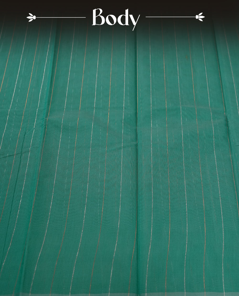 Sea green colour silk cotton saree featuring with delicate vertical copper & silver zari lines on the body, Crafted without a border for a classy touch, Comes with a matching blouse for a perfectly coordinated look.