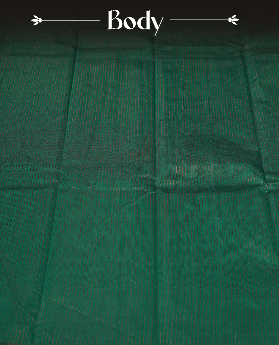 Peacock green colour silk cotton saree featuring with full of delicate vertical copper zari lines on the body & rich black colour pallu, Crafted without a border for a classy touch, Comes with a matching blouse for a perfectly coordinated look.