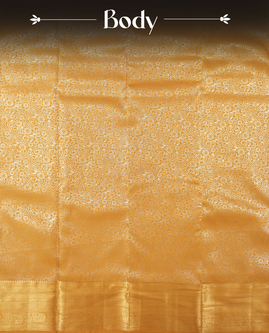Yellowish Gold colour and silver Zari Tissue Brocade Saree features intricate floral Motifs on body and golden colour traditional border & pallu, paired with matching blouse