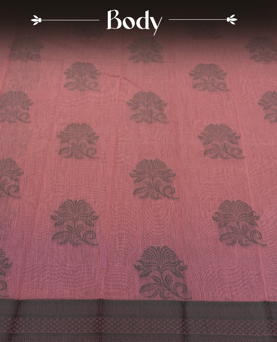 Mauve colour silk cotton saree featuring elegant floral zari motifs on the body, complemented by a rich contrast dark border and pallu with traditional woven detailing & Comes with a matching blouse piece.