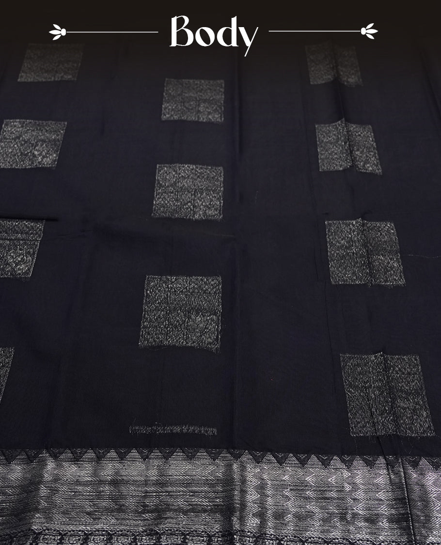 Black Silk Cotton Saree with Silver Rectangular/Square Butta Body, Featuring Silver Zari Chevron Patterned Border on Grand Pallu, Paired with Matching Gray/Silver Plain Blouse Piece
