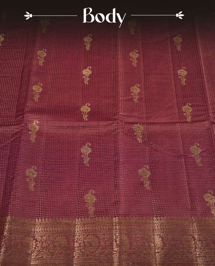 Maroon colour pure banarasi tussar Saree with antique design & golden motifs on the body, accentuated with an elegant traditional border, rich woven pallu and matching blouse piece.
