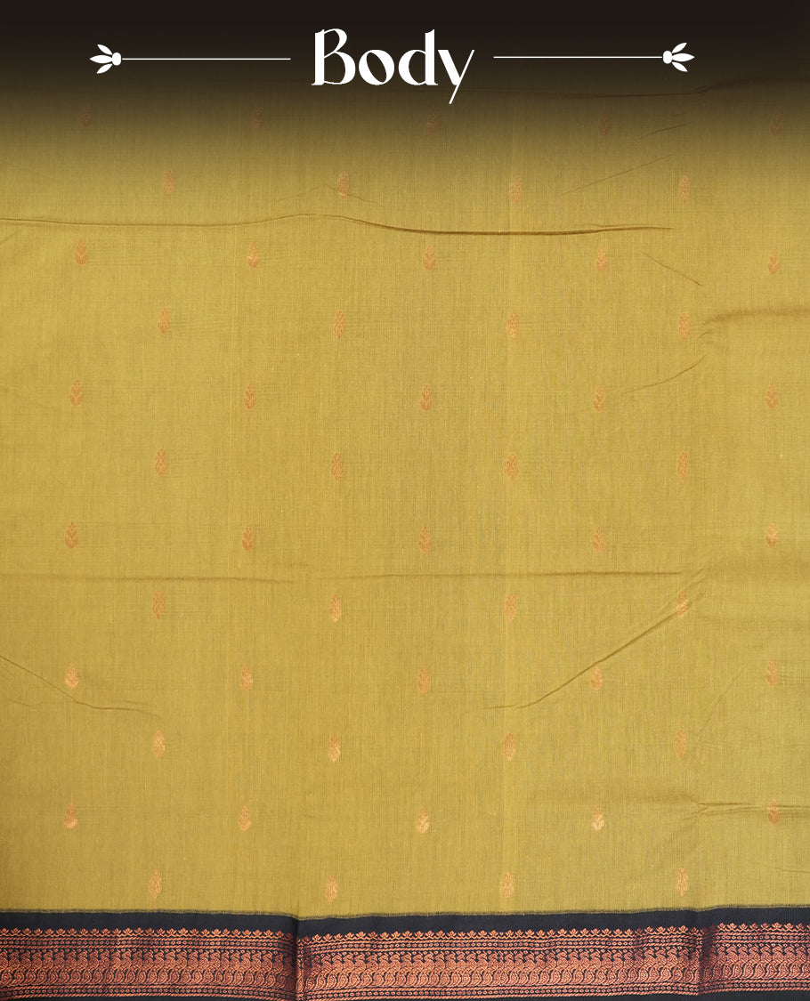 Sand colour Kalyani Cotton saree with subtle zari woven motifs all over, paired with a contrasting deep navy blue rich copper zari border and pallu & Comes with a matching blouse piece.