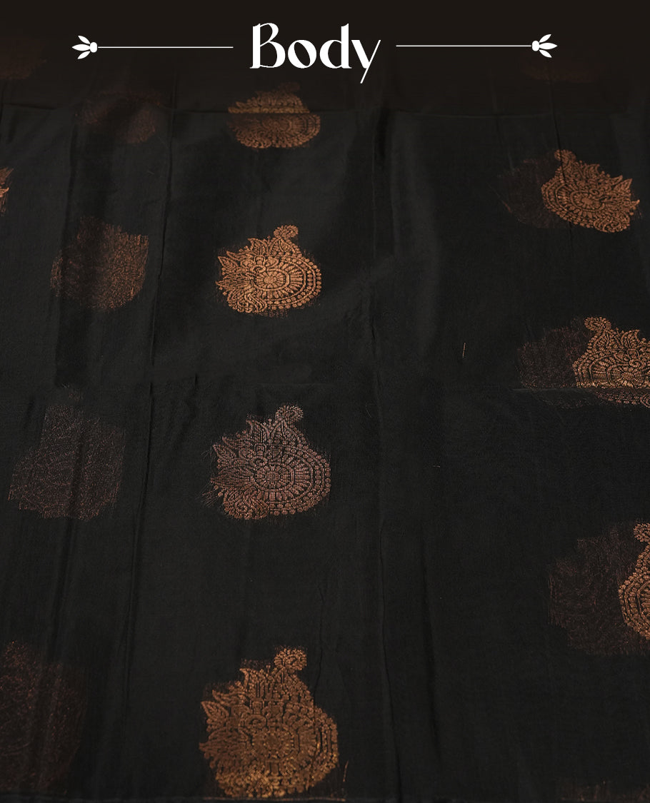 Black colour soft silk cotton saree adorned with copper zari motifs and a shimmering copper zari border, Enhanced by a beautifully rich beige colour woven pallu & Comes with a matching blouse piece for a complete look.
