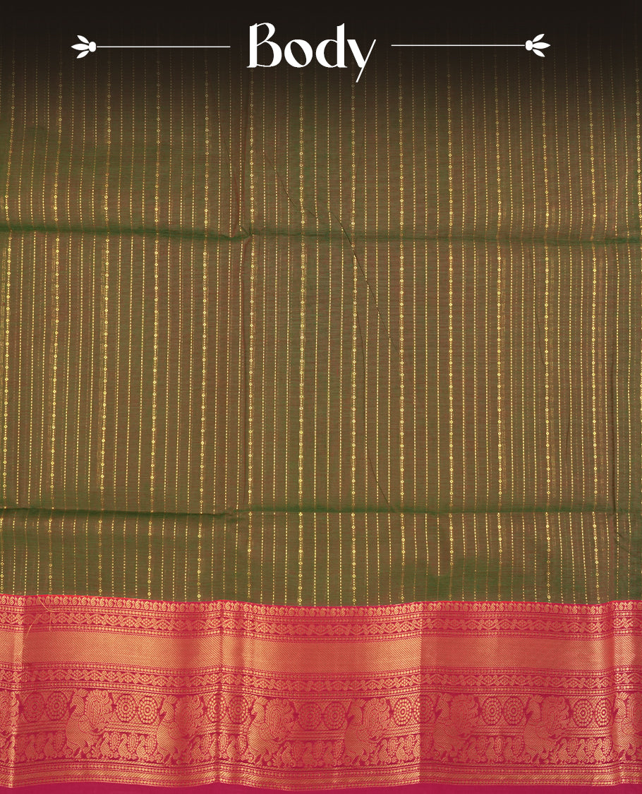 Green and magenta colour dual shaded Chettinad cotton saree adorned with delicate golden zari lines on the body, The rich magenta border features intricate floral and paisley zari motifs & Comes with a matching blouse piece.