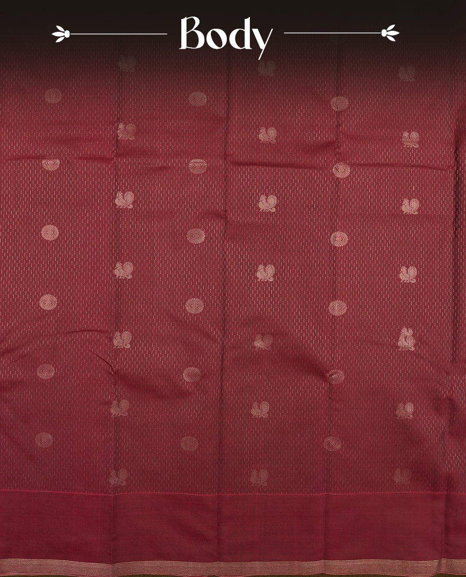 Dark maroon colour semi soft silk saree featuring a self coloured golden textured patterned body, complemented by self coloured pallu & golden border and a matching blouse piece.