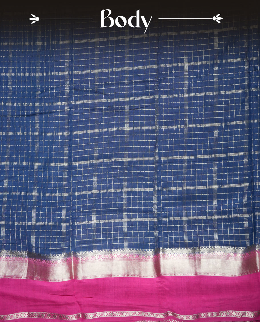 Navy blue colour mixed chanderi cotton saree with zari checkered body, rose gold zari border, magenta-pink pallu with checks, and matching magenta blouse.