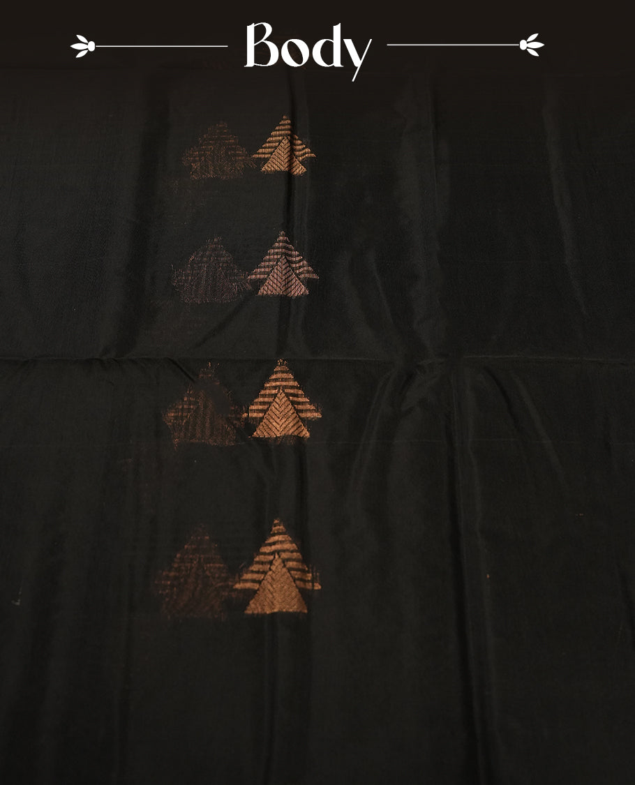 Black colour soft silk cotton saree adorned with copper zari motifs and a shimmering copper zari border, Enhanced by a beautifully rich teal colour woven pallu & Comes with a matching blouse piece for a complete look.