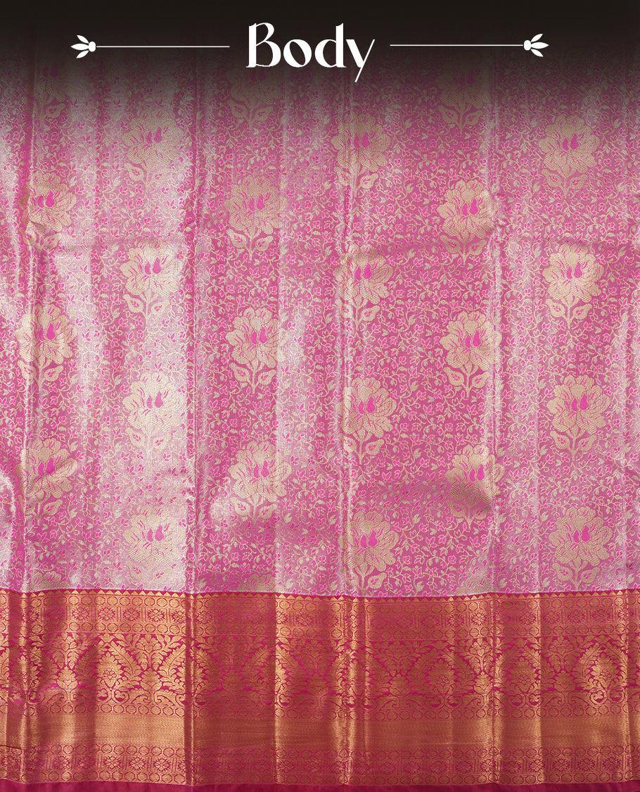 Magenta colour and gold & silver Zari Tissue Brocade Saree features intricate floral Motifs on body and dark red contrast border & pallu with traditional pattern, paired with matching blouse
