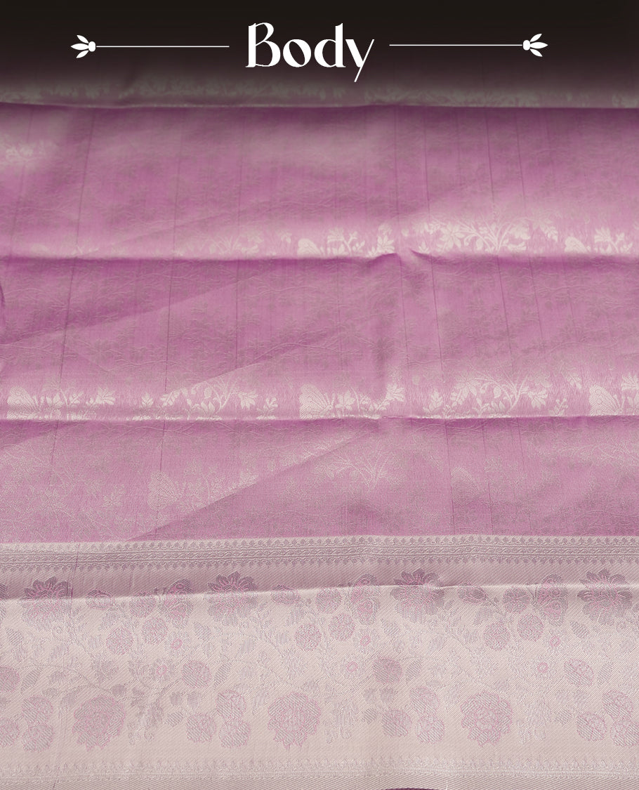 Light Lavender Colour Silk Saree with Allover Subtle Floral Self-Weave, Contrasting Silver Zari Woven Pallu and Border with Intricate Patterns and Tassels, Paired with Matching Blouse Piece