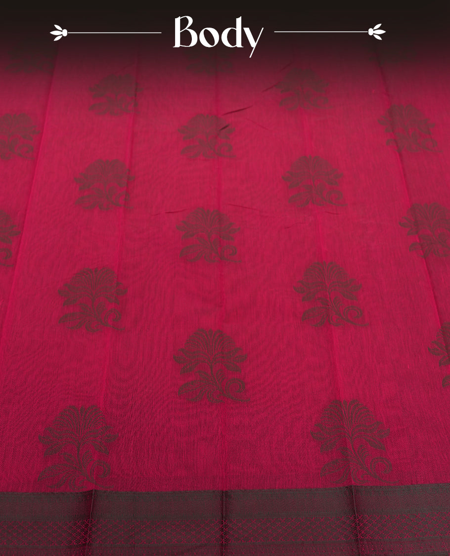 Wine berry colour silk cotton saree featuring elegant floral zari motifs on the body, complemented by a rich contrast dark border and pallu with traditional woven detailing & Comes with a matching blouse piece.