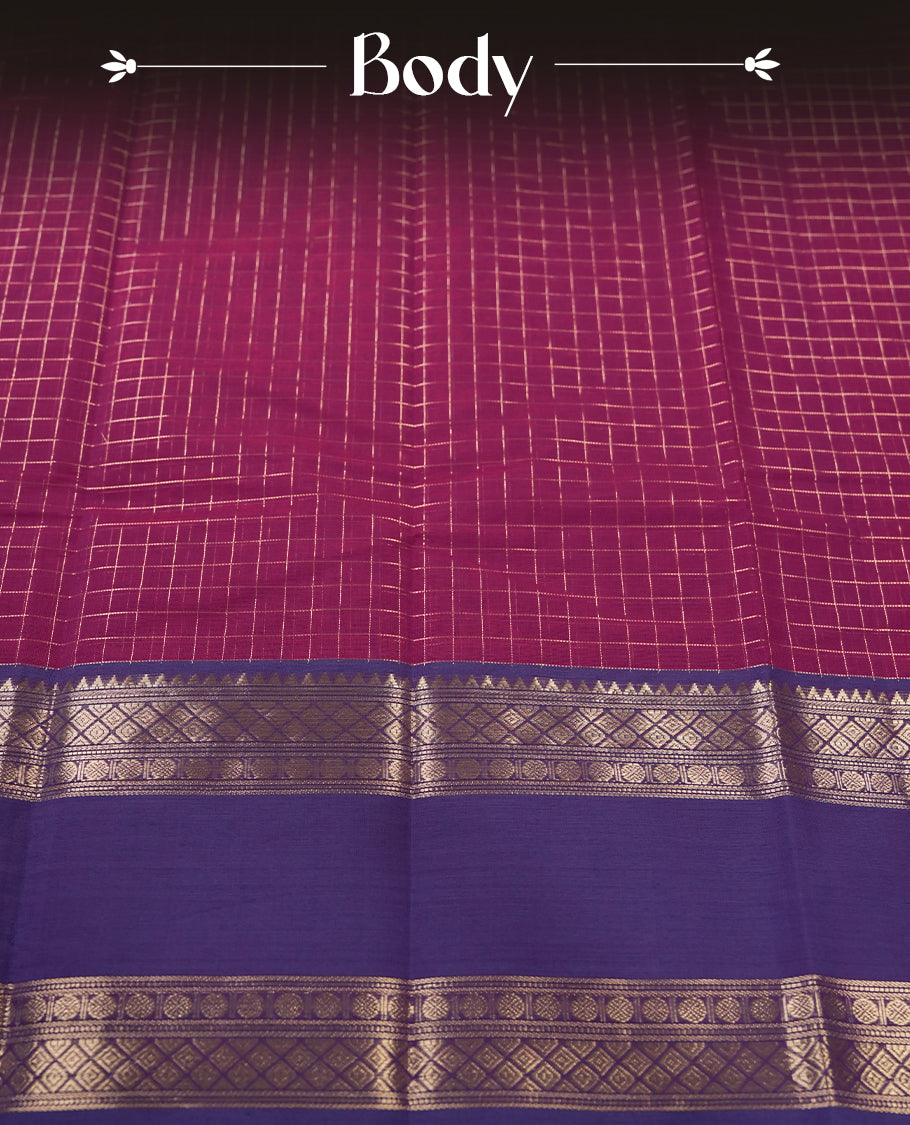 Magenta colour pure Kanchi cotton saree featuring with delicate golden checks on body, paired with a contrasting violet zari woven border & Includes a matching blouse piece for a complete look.