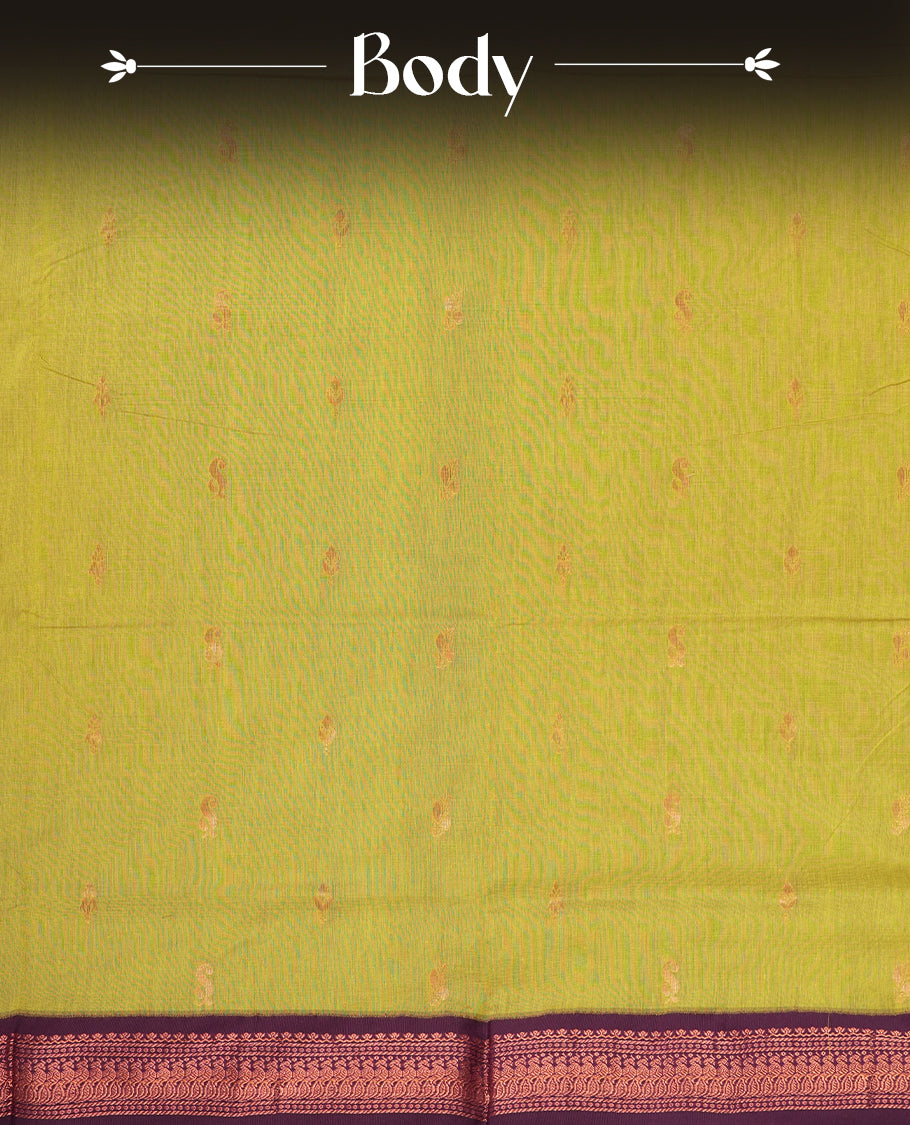 Lemon green colour Kalyani Cotton saree with delicate woven zari golden motifs all over, paired with a contrasting wine border and pallu intricately woven with rich zari & Comes with a matching blouse piece.