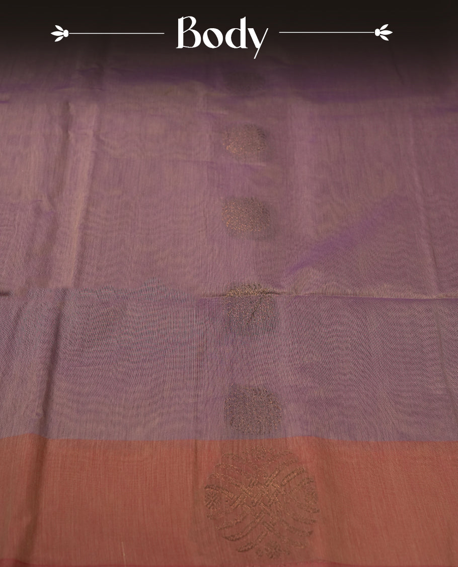 Deep mauve colour soft silk cotton saree adorned with copper zari motifs and a shimmering copper zari border, Enhanced by a beautifully rich grape colour woven pallu & Comes with a matching blouse piece for a complete look.