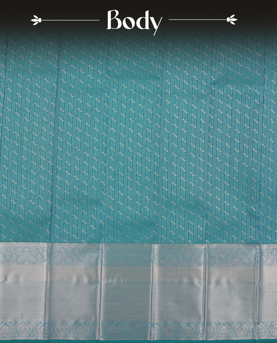 Teal Blue Colour Semi Silk Saree with Silver Diagonal Striped Butta Body, Self Coloured Silver Zari Pallu & Border, Paisley Motifs, and Matching Blouse Piece