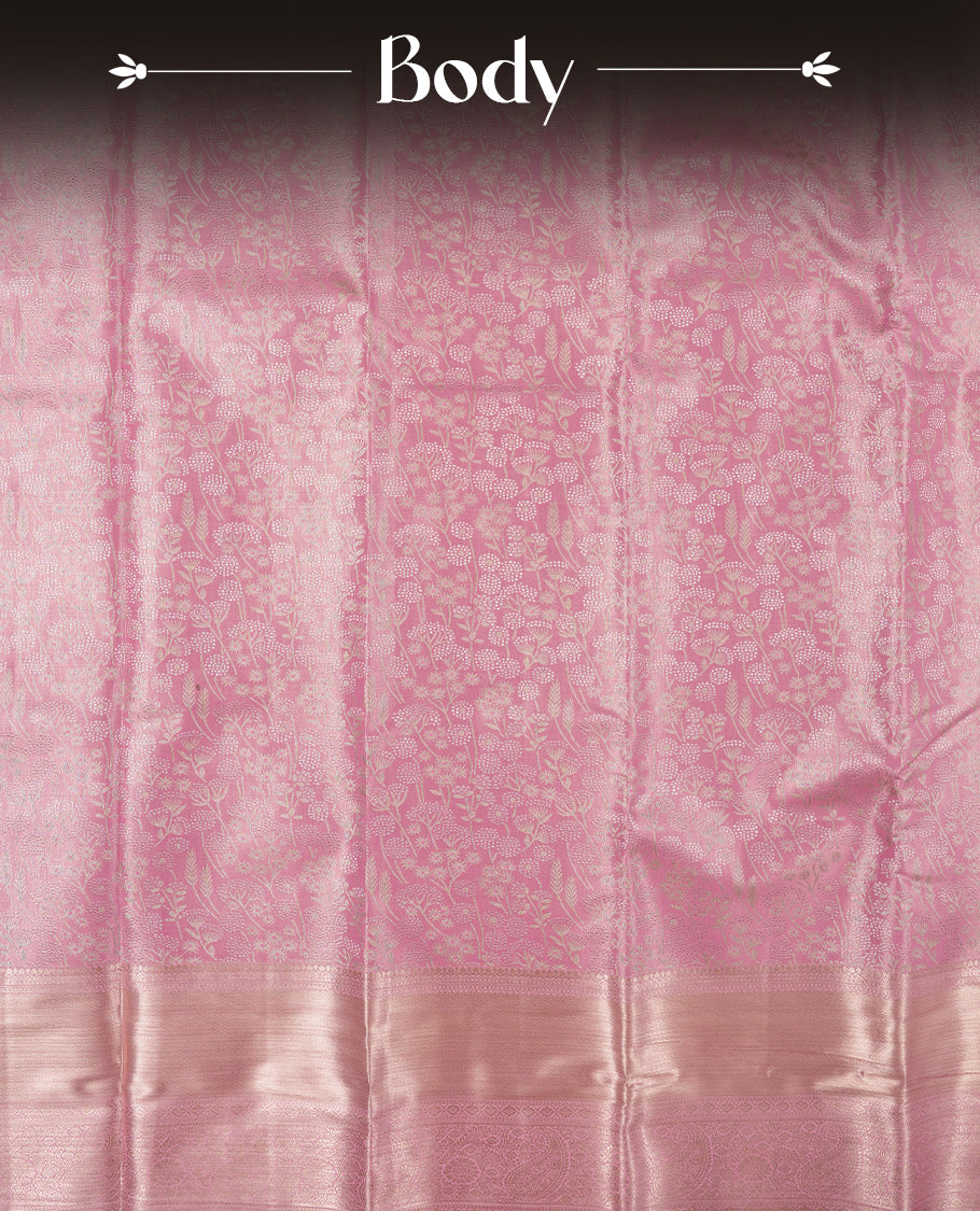 Taffy pink colour and silver Zari Tissue Brocade Saree features intricate floral Motifs on body and self coloured with gold traditional border & pallu, paired with matching blouse