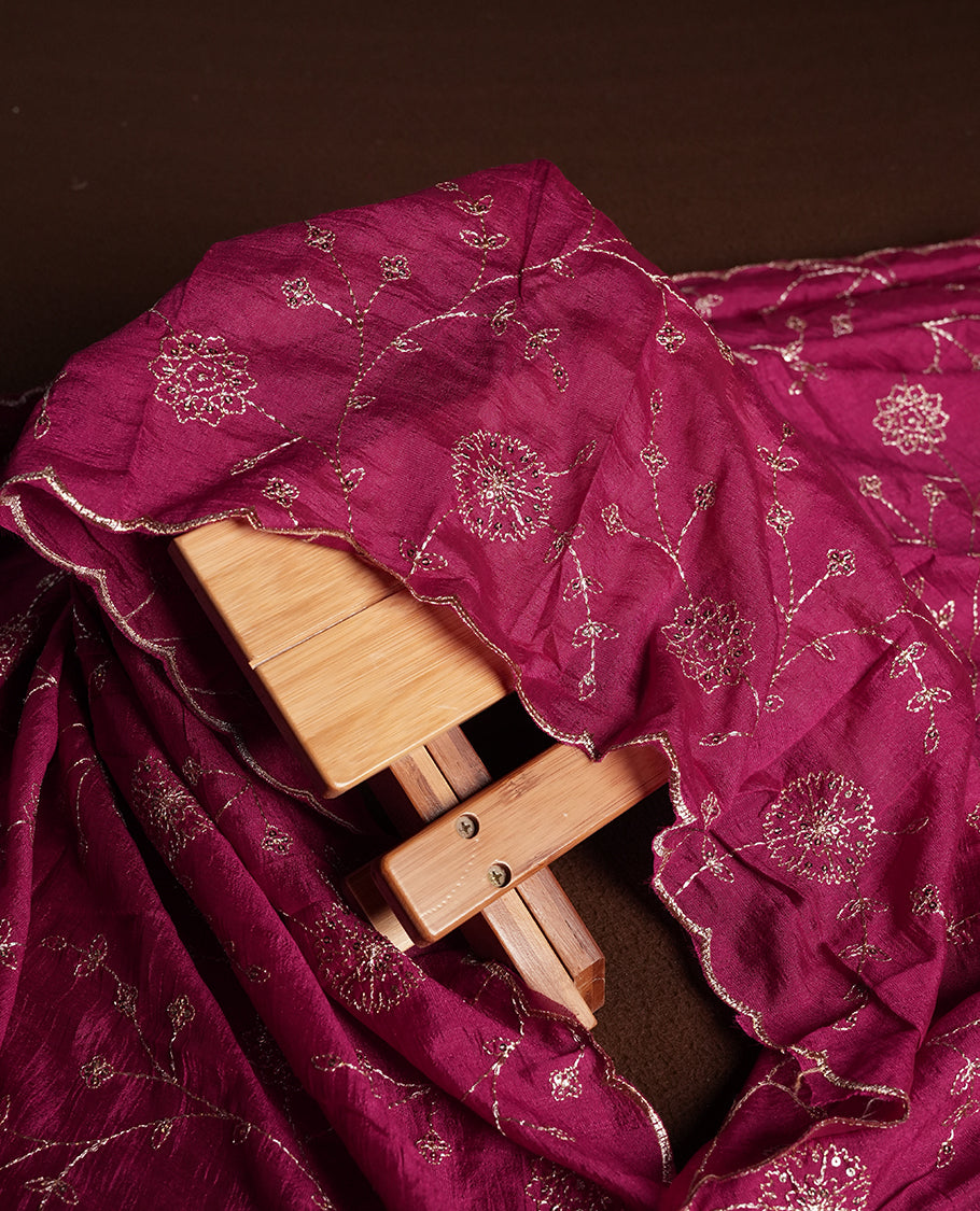 Golden Cream colour churidhar material featuring thread embroidery on the front panel, contrast maganta colour dupatta with elegant border, and matching plain bottom