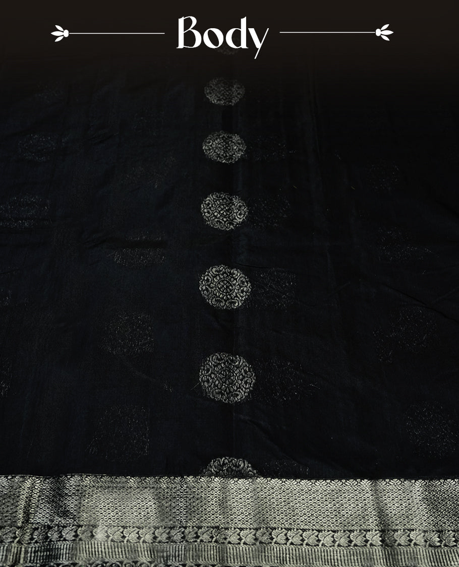 Navy blue colour silk cotton saree with shimmering silver zari border and intricately woven pallu, blending elegance and tradition, Paired with a matching blouse, perfect for festive celebrations and special occasions.