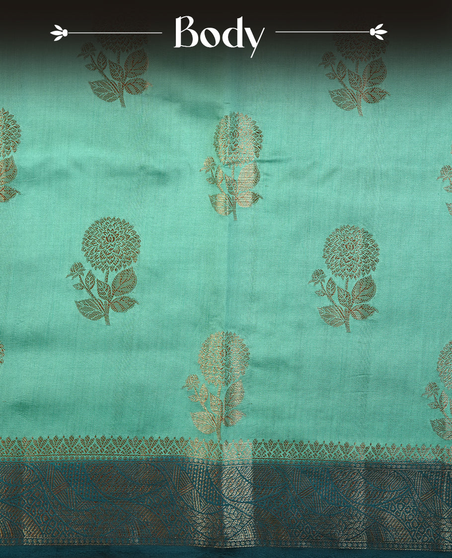 Aqua Green colour Pure tussar Banarasi saree featuring Gold zari motifs on body, a contrast Teal colour gold zari border, and blouse piece.