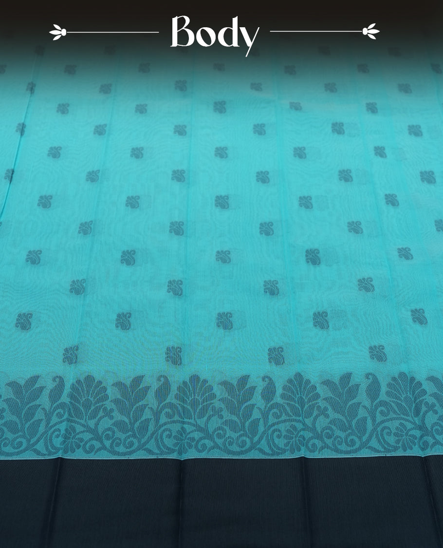 Sky blue colour silk cotton saree featuring elegant floral zari motifs on the body, complemented by a rich contrast dark plain border and pallu with traditional woven detailing & Comes with a matching blouse piece.