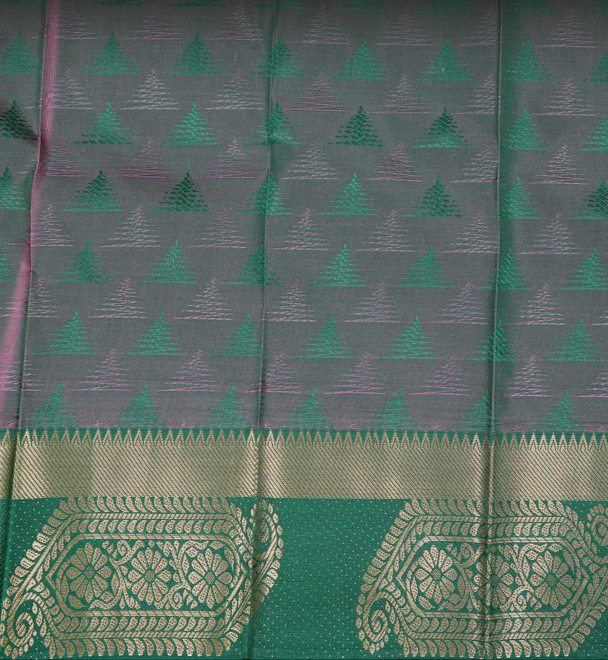 Baby pink colour Semi silk saree Featuring self colour zari motifs on body, complemented by contrast green colour with gold zari border, paired with matching blouse piece.
