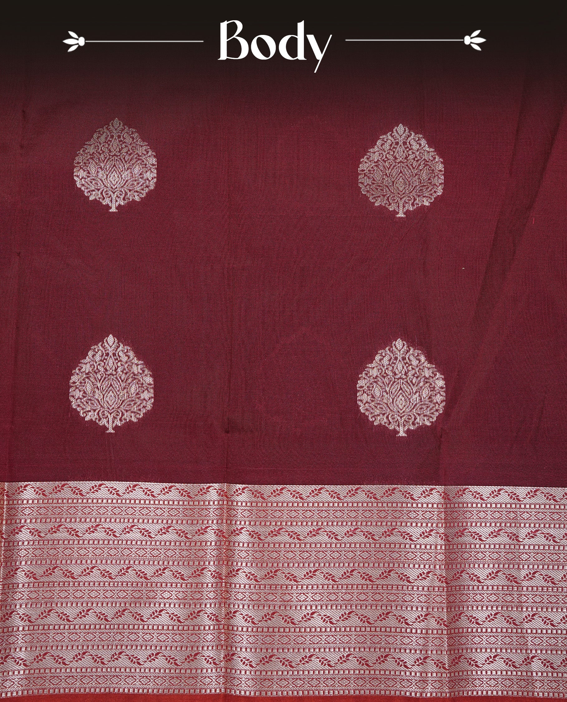 Maroon colour Semi silk saree Featuring gold zari motifs on body, complemented by Self colour with gold zari border, paired with matching blouse piece.