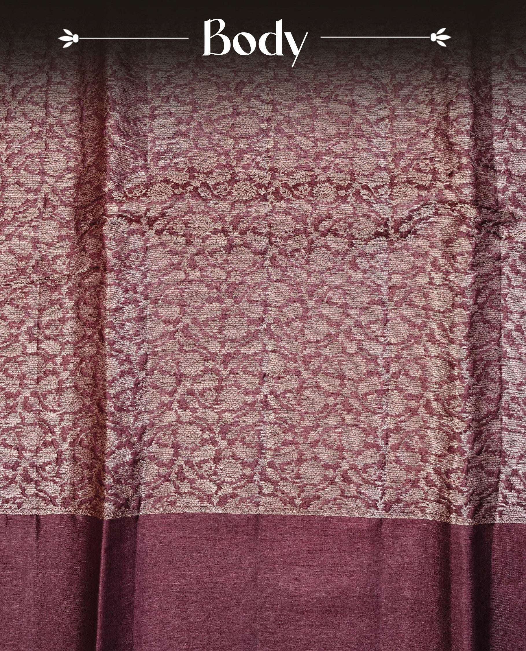 Chocolate Brown colour pure tussar silk saree featuring light gold zari floral kodi work on the body, a plain border, grand pallu,Paired With a matching blouse piece.