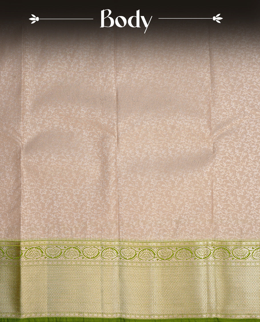 Silver colour semi wedding saree featuring silver zari floral kodi pattern on body, contrast Light green colour with traditional border, paired with matching blouse piece.