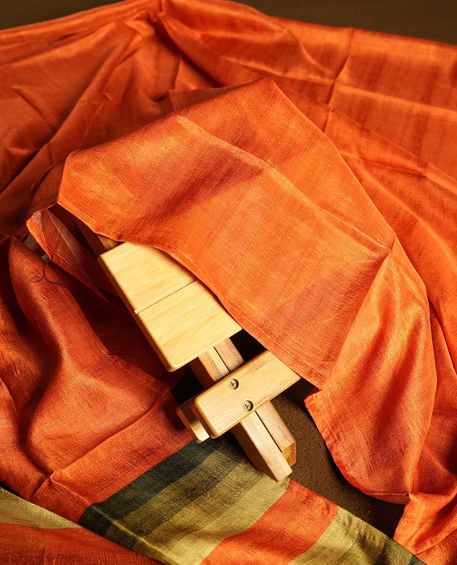 Orange colour churidhar material featuring elegant horizontal stripes on the yoke and dupatta, woven in shades of Green and Orange & Paired with a matching plain bottom