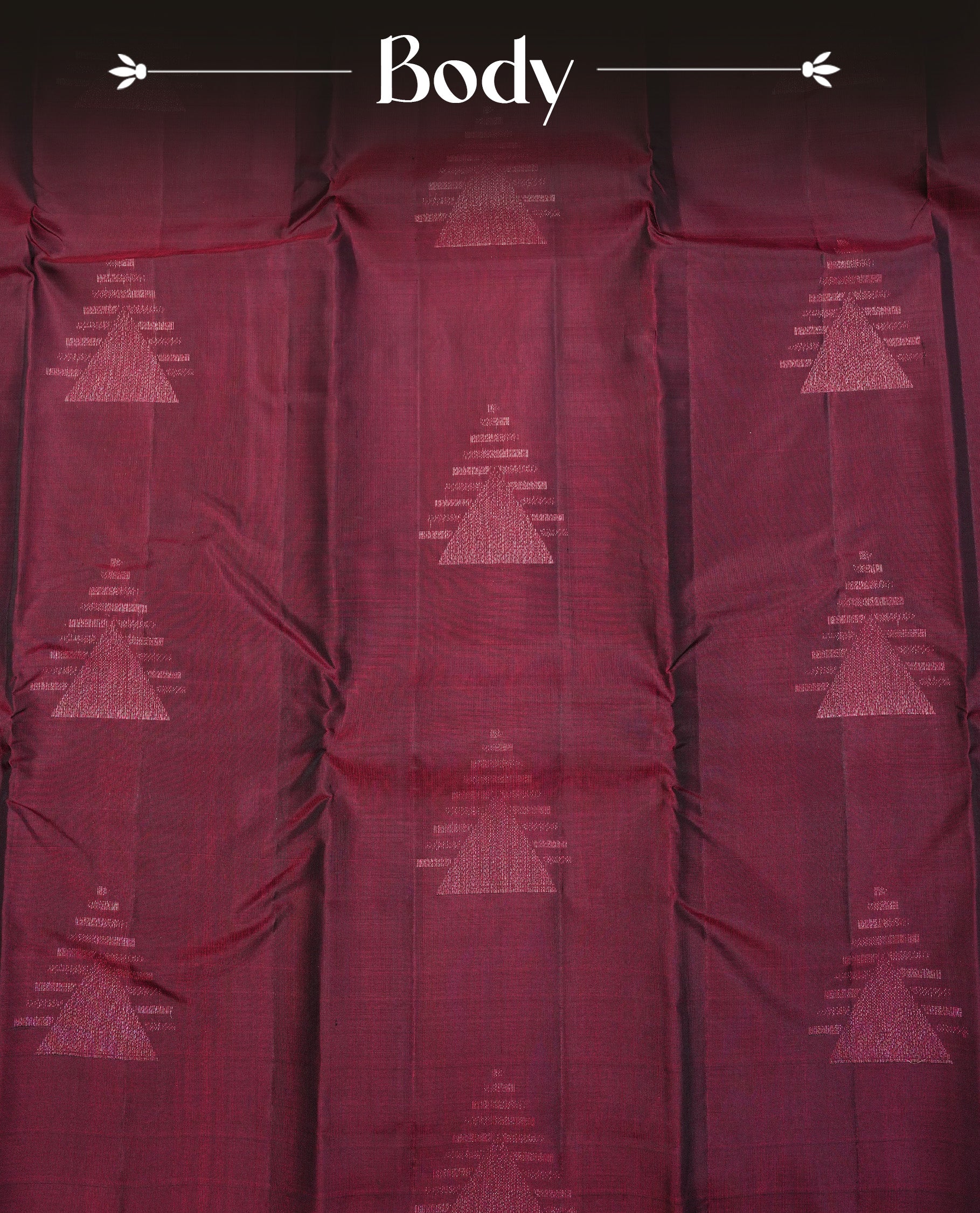 Wine Colour Traditional Kancheepuram Silk Saree Featuring Light Gold Zari Triangle Motifs on the Body, Designed Without a Border and with a Grand Pallu, Paired with a Matching Blouse.