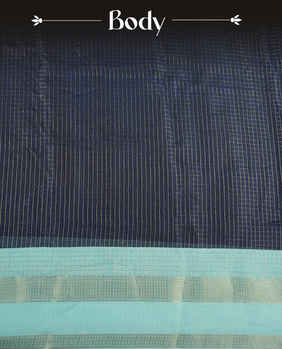Navy Blue colour saree featuring fine check patterns on the body, paired with a Aqua Blue zari woven border and pallu. Comes with a matching blouse piece