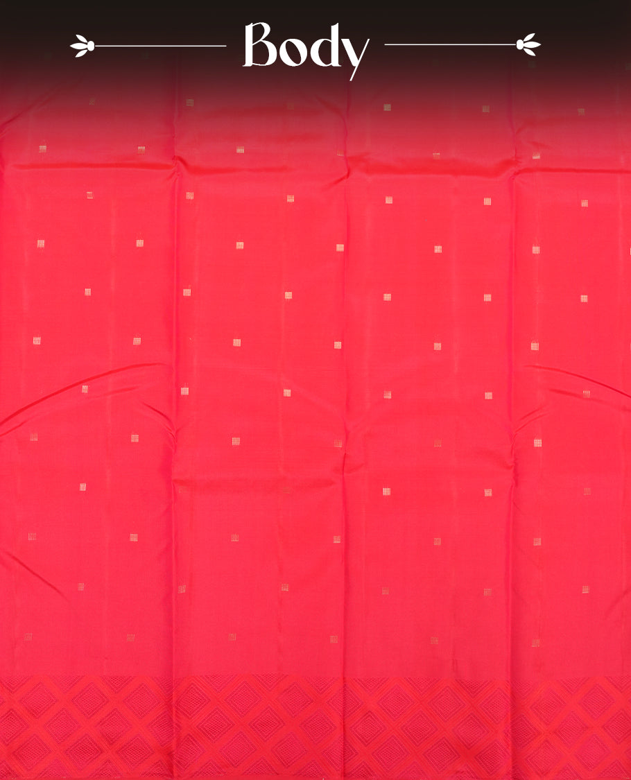 Rani pink colour Vasundhara silk saree adorned with all-over gold square motifs on the body, complemented by a self colour with box pattern on border and paired with a matching blouse piece.