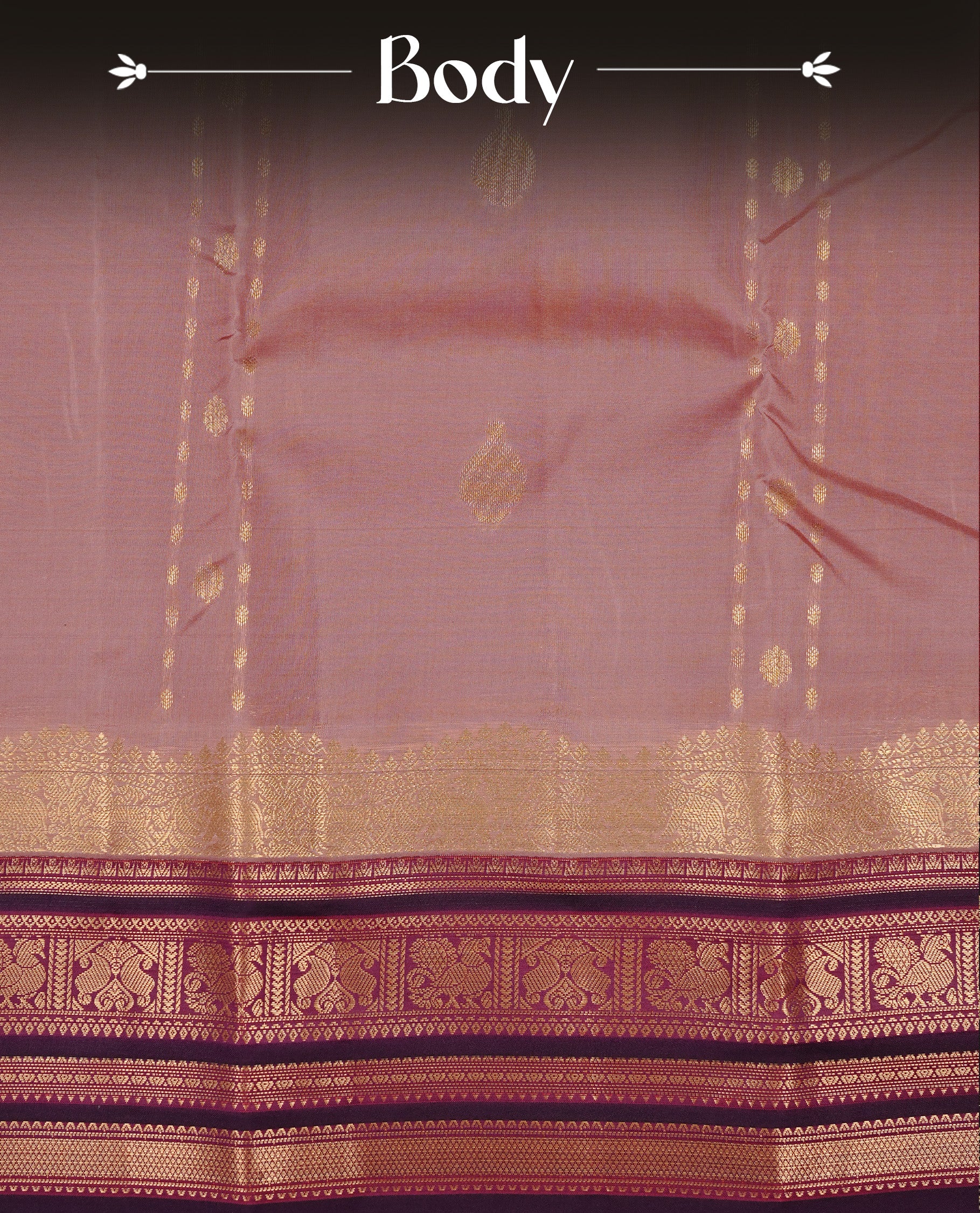 Mauve colour Traditional Kancheepuram silk saree featuring gold zari motifs on body, enhanced with contrast Purple with traditional border, paired with matching blouse piece.