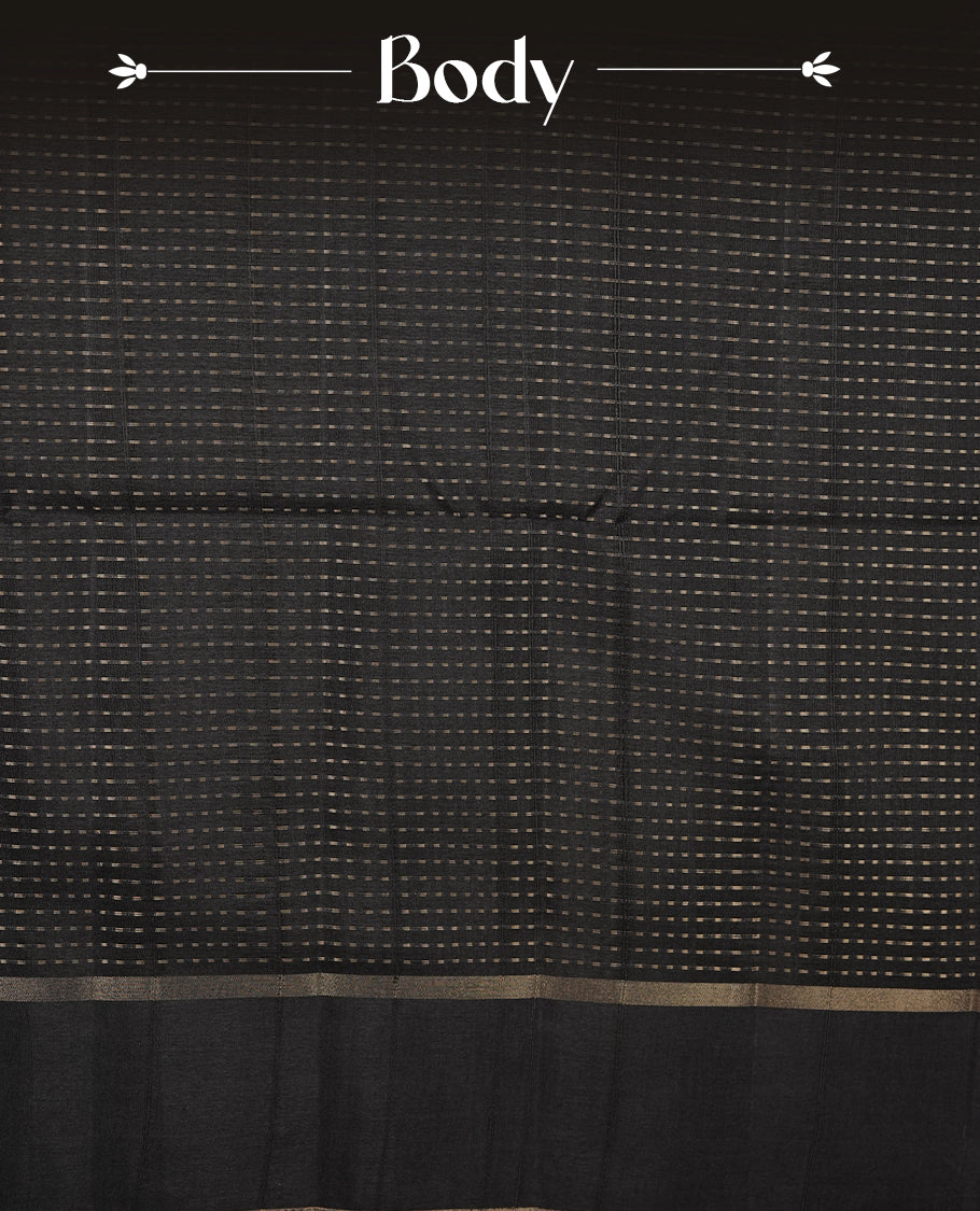 Black colour semi tussar silk saree highlighting gold zari dotted stripes, self colour border and contrast dark gold pallu and comes with matching blouse piece.