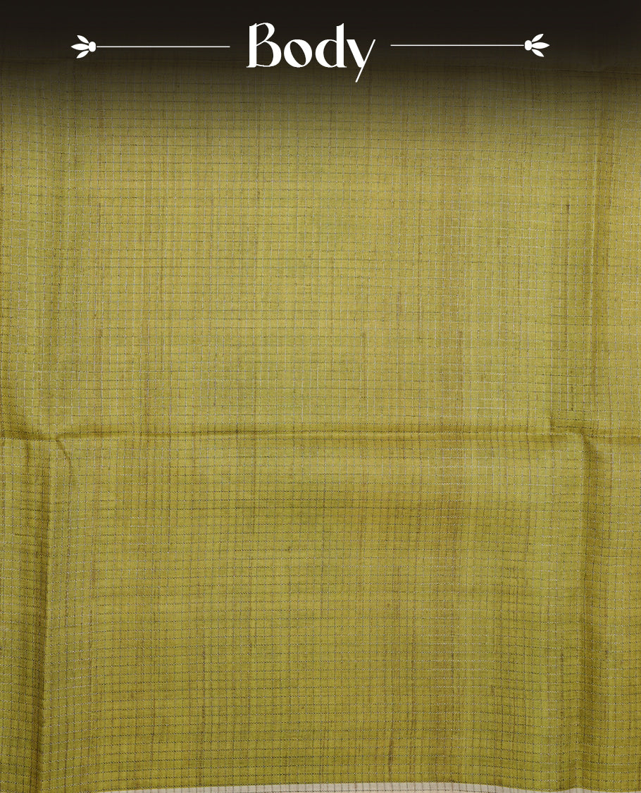 Green colour semi tussar silk saree featuring Antique zari check pattern across body, contrast Cream colour border with elephant print and pallu, paired with matching blouse piece.