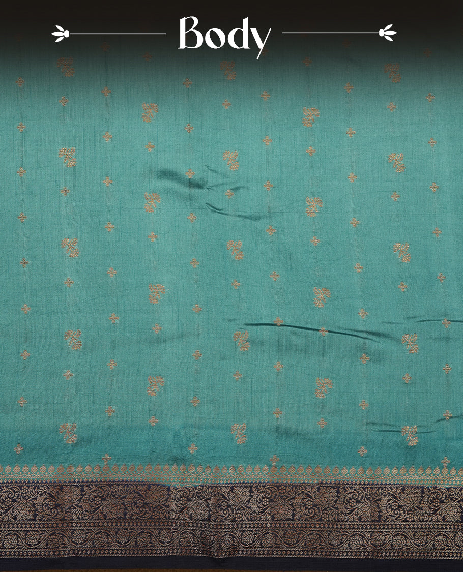 Steel blue colour Pure banaras soft silk saree featuring Antique zari motifs on body, contrast navy blue colour border , traditional pallu and paired with matching blouse