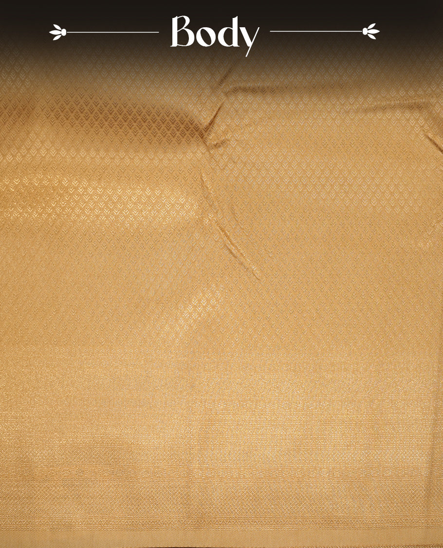 Light gold colour semi soft silk saree featuring gold zari motifs on across body, self colour border with traditional gold zari pattern, pallu and paired with matching blouse.