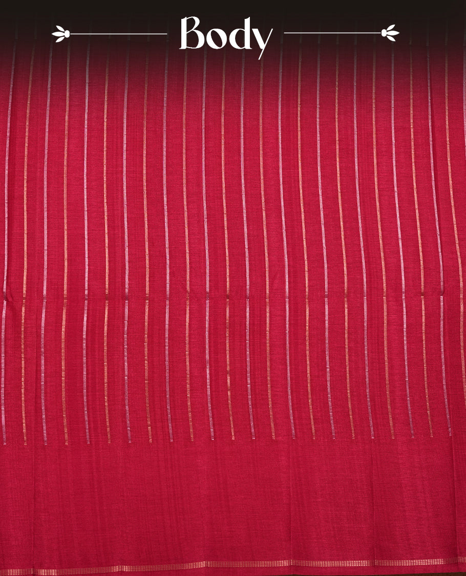 Pinkish Maroon colour semi tussar silk saree highlights gold and silver zari stripes across body, border, pallu and paired with matching blouse piece.