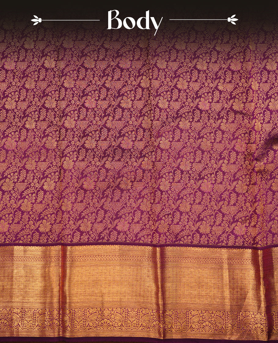 Purple colour kancheepuram silk saree featuring gold zari floral kodi pattern on body, complemented by self colour with traditional border, paired with matching blouse piece.