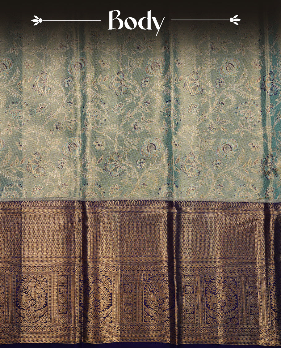 Gold & aqua double shade kancheepuram tissue silk saree featuring gold zari floral kodi pattern on body, complemented by contrast indigo colour with traditional border, paired with matching blouse piece.