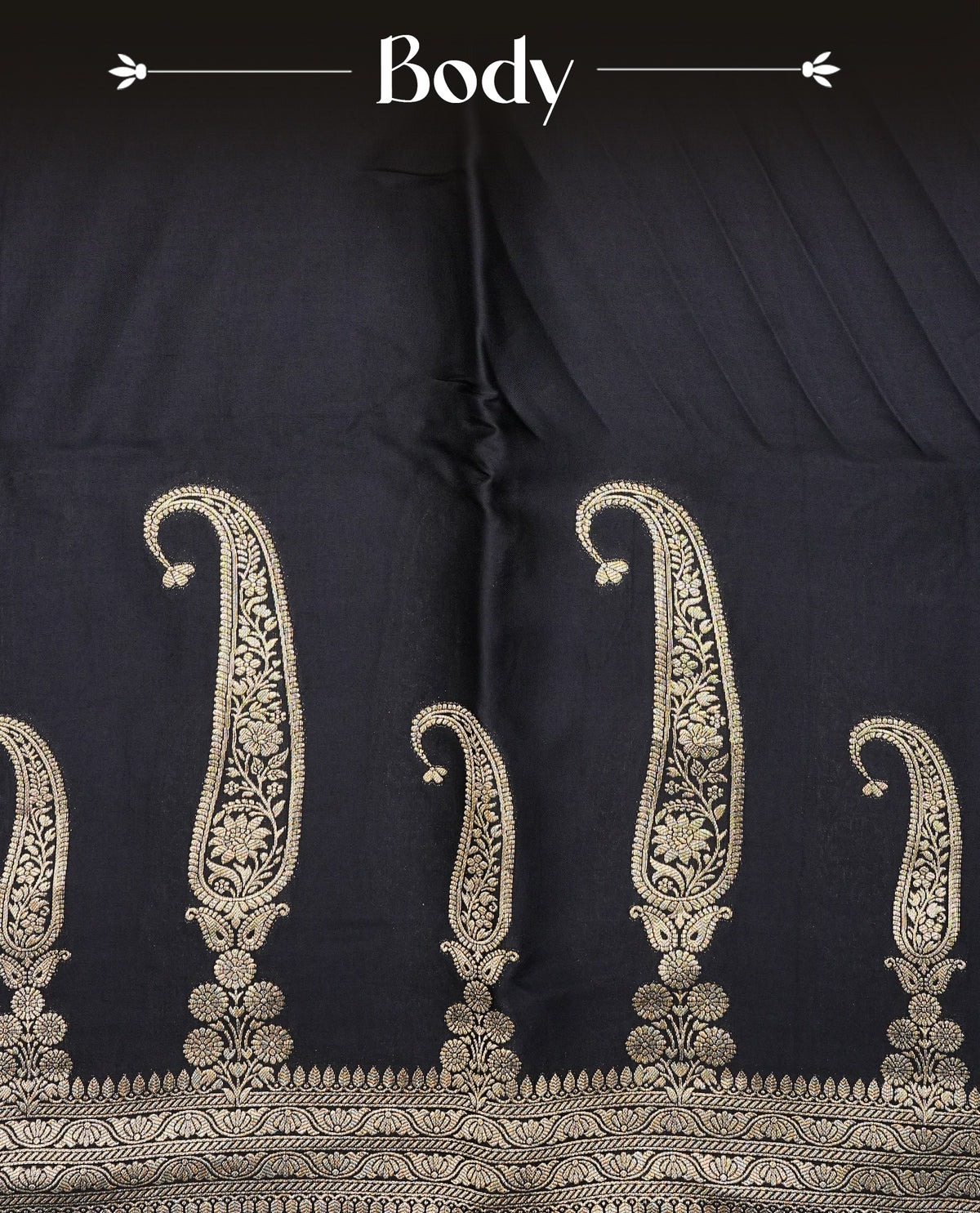 Black colour Banaras satin crepe silk saree featuring Plain body, associate with Gold zari traditional border, comes with matching blouse piece.