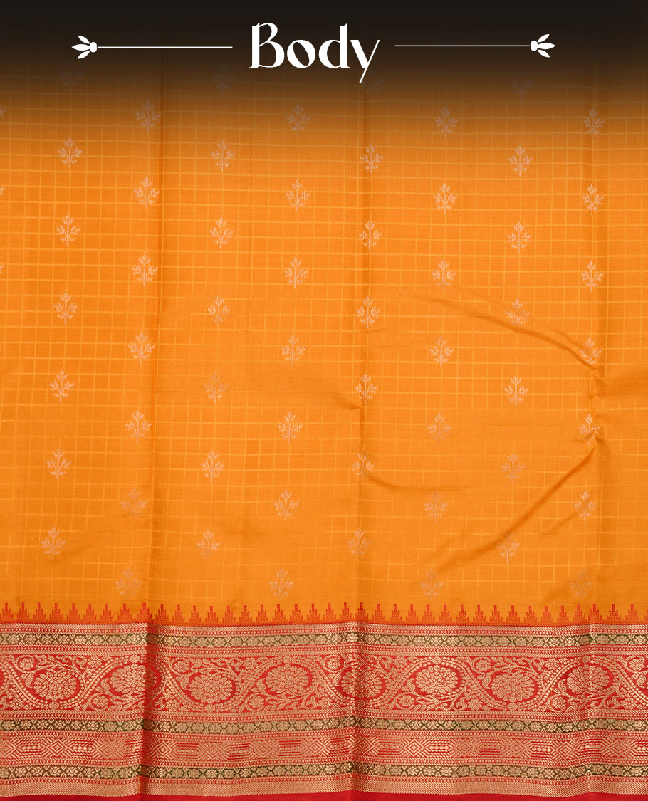 Mustard colour traditional kancheepuram silk saree featuring gold zari check pattern on body, complemented by contrast red colour with gold zari traditional border, paired with matching blouse piece.