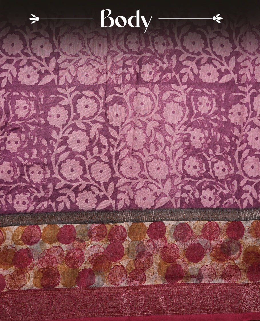 Purple colour chanderi silk saree featuring floral kodi print pattern across body, with contrast red colour border with zari pattern and paired with matching blouse.