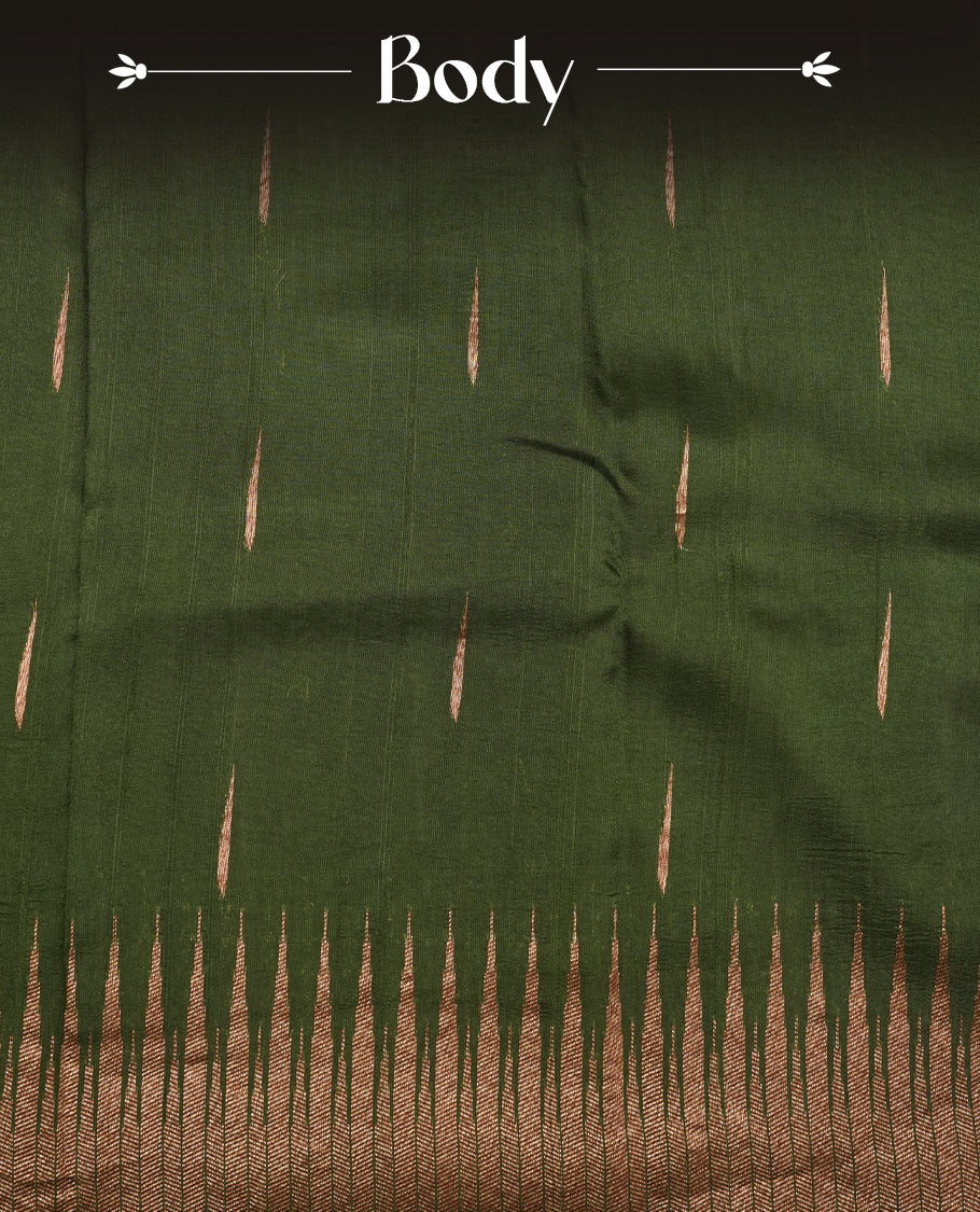 Dark green colour semi banaras tussar georgette saree featuring antique gold zari buttas on body, temple pattern on border and floral pattern on pallu, paired with matching blouse piece.