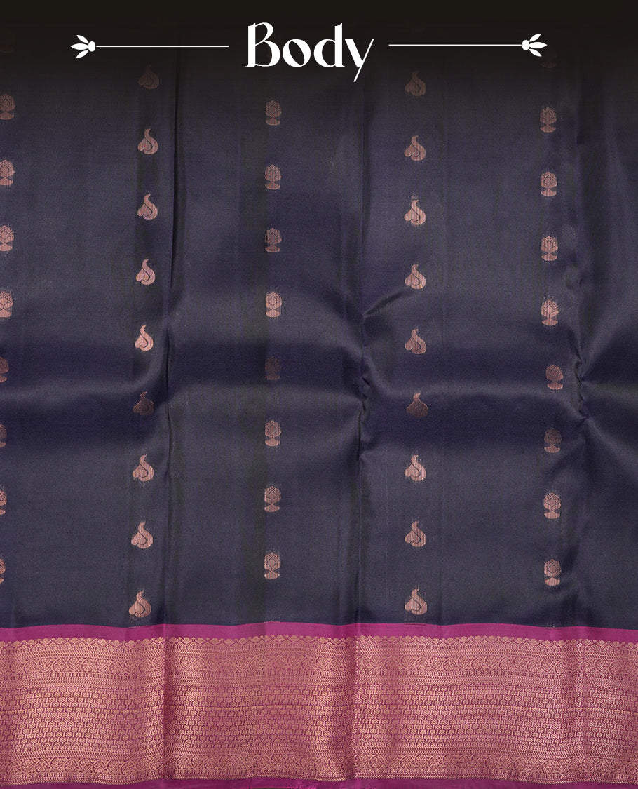 Navy blue colour Soft silk saree featuring gold zari motifs on the body, complemented by a contrast magenta traditional zari border and pallu, paired with a matching blouse piece.